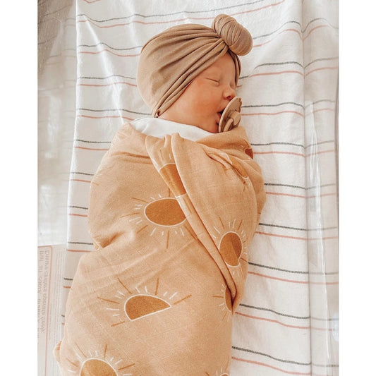 Golden Hour Muslin Swaddle