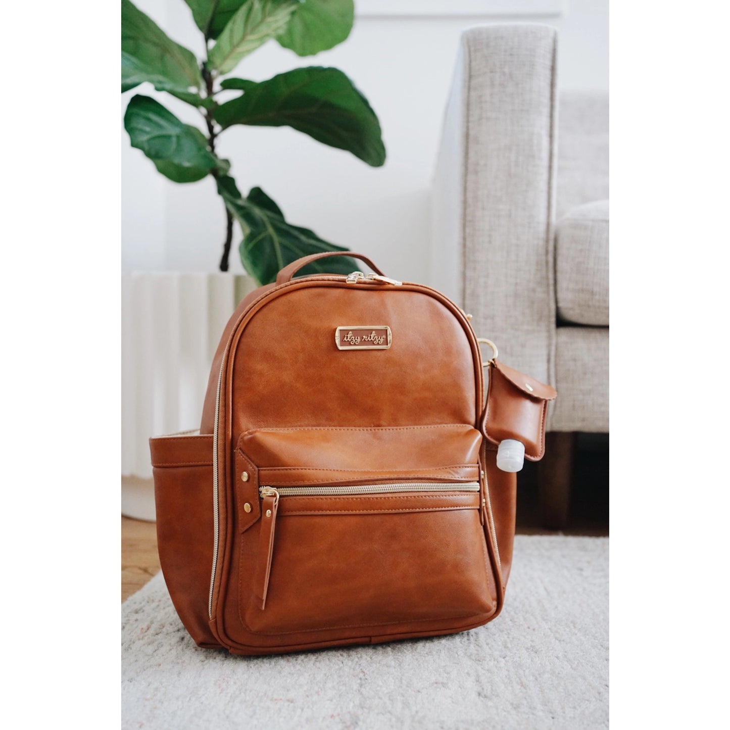 Itzy Ritzy Mini Plus Diaper Bag | Cognac